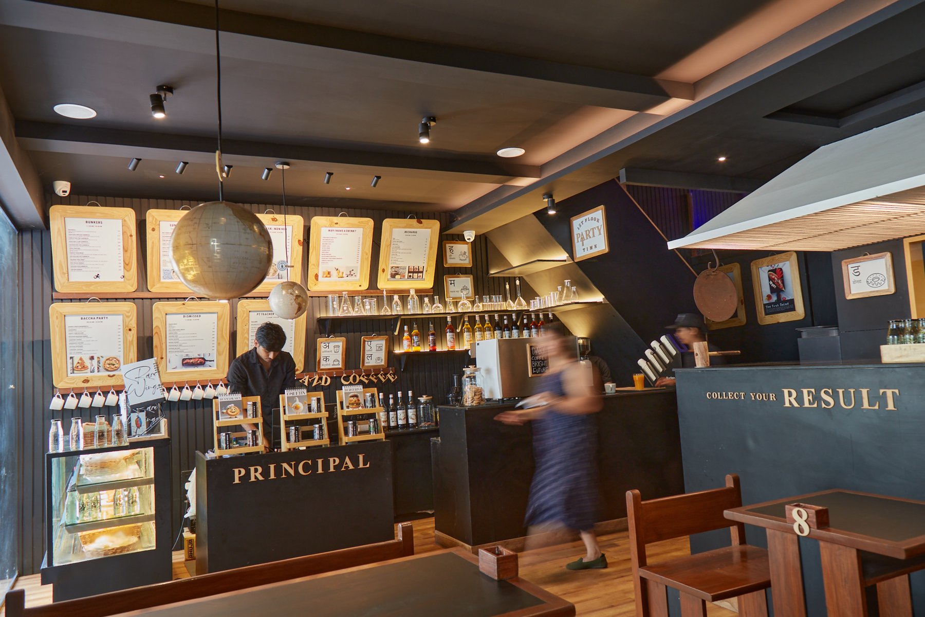 Chalkboard welcome sign at Café School Alibaug